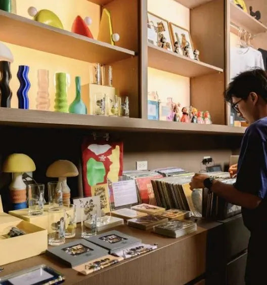 Shelves of objects and records inside The Wireless Club